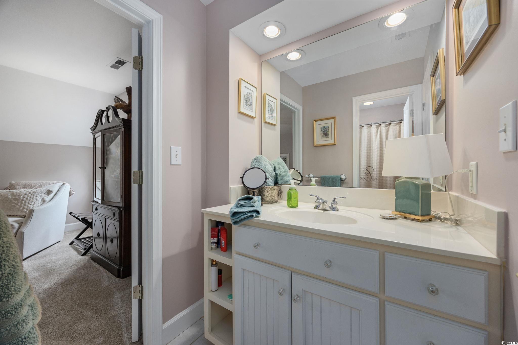 3750 Highway 813 Conway Sc 29526 Conway, SC 29526 - Photo 25 of 40 Full bath with vanity, recessed lighting, curtained shower, and vaulted ceiling