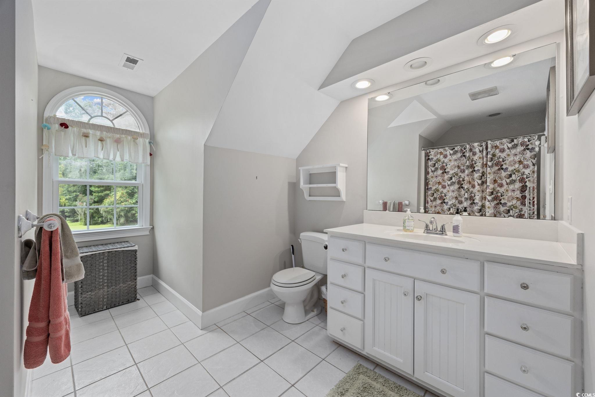 3750 Highway 813 Conway Sc 29526 Conway, SC 29526 - Photo 28 of 40 Bathroom with vanity, vaulted ceiling, light tile patterned flooring, recessed lighting, and a shower with shower curtain