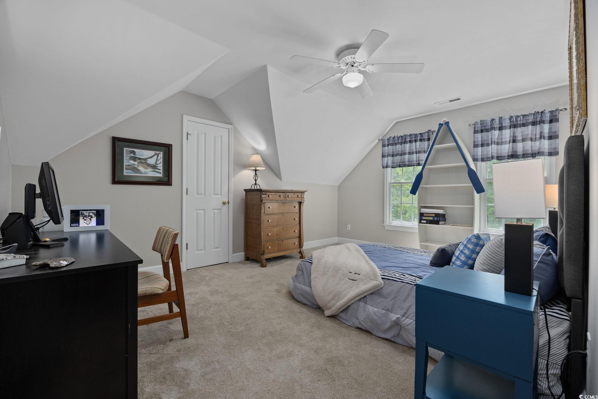 3750 Highway 813 Conway Sc 29526 Conway, SC 29526 - Photo 29 of 40 Bedroom with vaulted ceiling, light carpet, a ceiling fan, and an office area