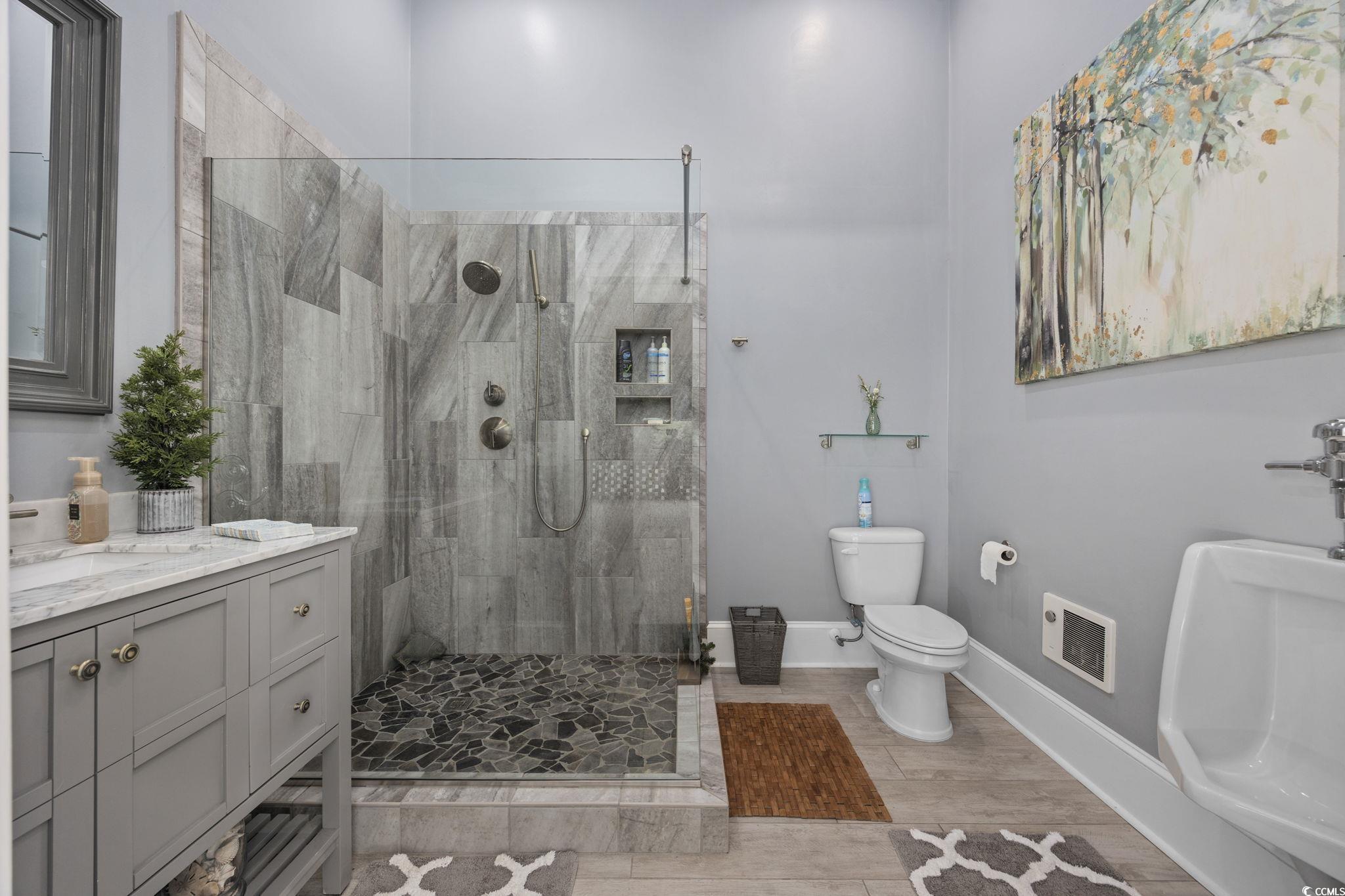 3750 Highway 813 Conway Sc 29526 Conway, SC 29526 - Photo 31 of 40 Full bath featuring vanity, a stall shower, light wood-style flooring, and heating unit