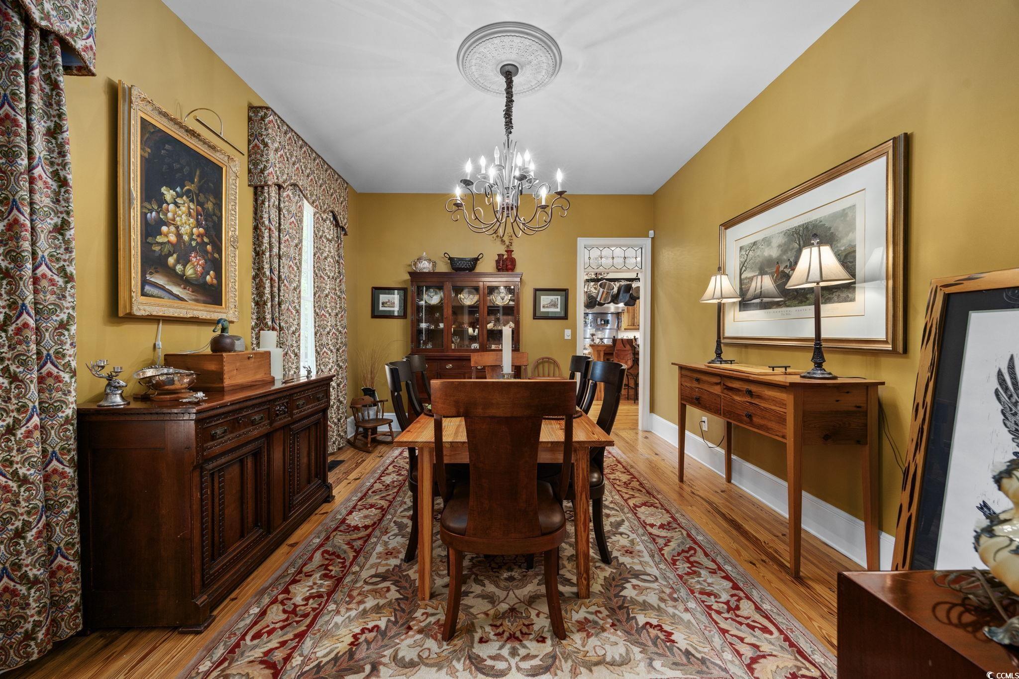 3750 Highway 813 Conway Sc 29526 Conway, SC 29526 - Photo 6 of 40 Dining space with a chandelier and light wood-type flooring