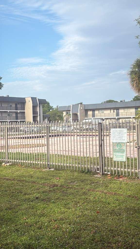 7910 North Colony Circle, Unit 101 Tamarac, FL 33321 - Photo 14 of 17 a view of a garden