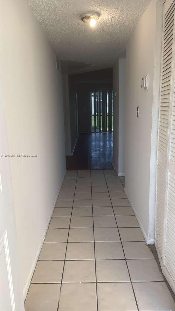 7910 North Colony Circle, Unit 101 Tamarac, FL 33321 - Photo 9 of 17 a view of entryway