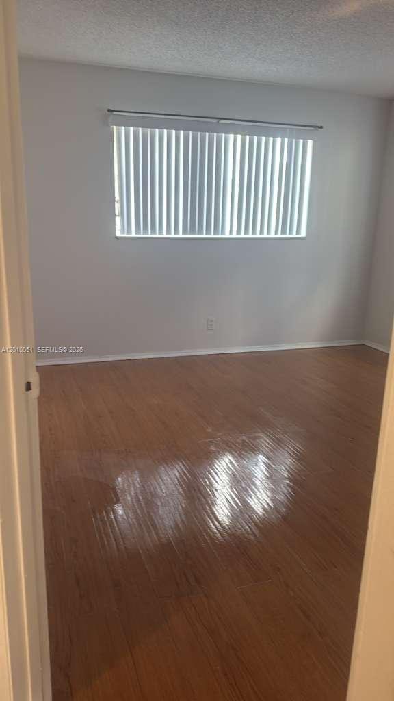 7910 North Colony Circle, Unit 101 Tamarac, FL 33321 - Photo 10 of 17 a view of room with window