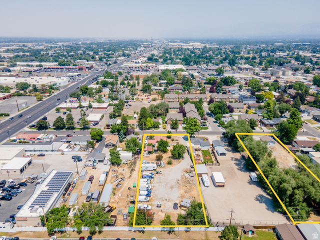 72 Cox Lane Midvale, UT 84047 - Photo 9 of 16 Aerial perspective showcasing expansive lots with varied terrain