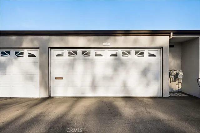 a swimming pool with outdoor seating and yard