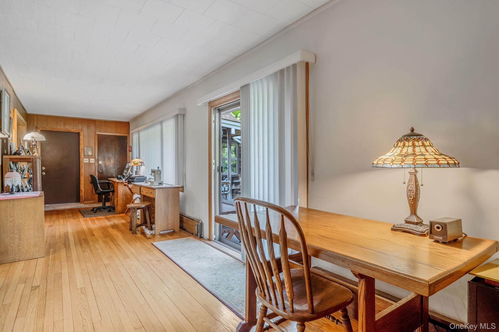 280 Deforest Road North Dix Hills, NY 11746 - Photo 21 of 37 a view of a livingroom with furniture and a window