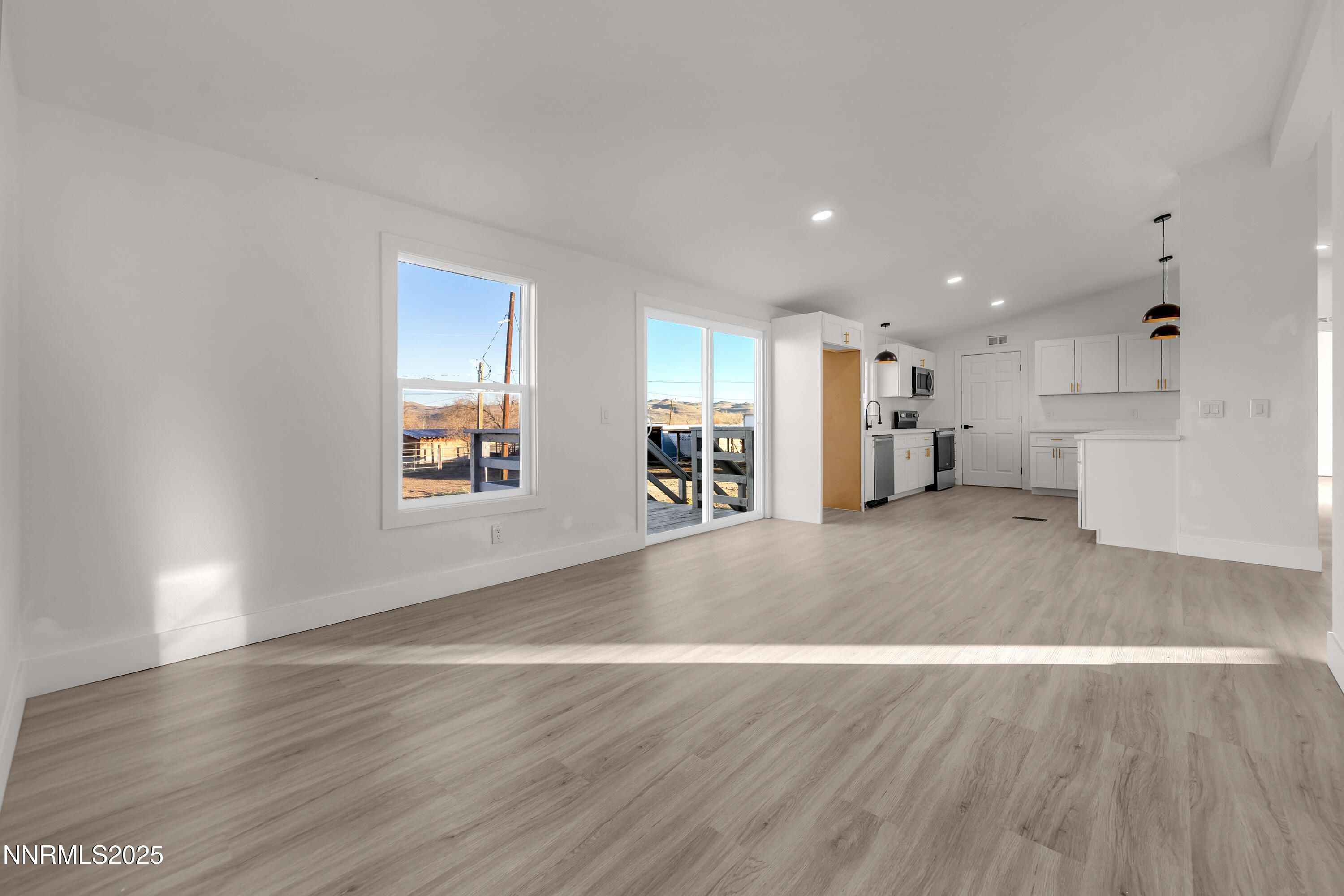320 Ramsey Way Reno, NV 89506 - Photo 13 of 40 a view of a kitchen with a sink and a large window