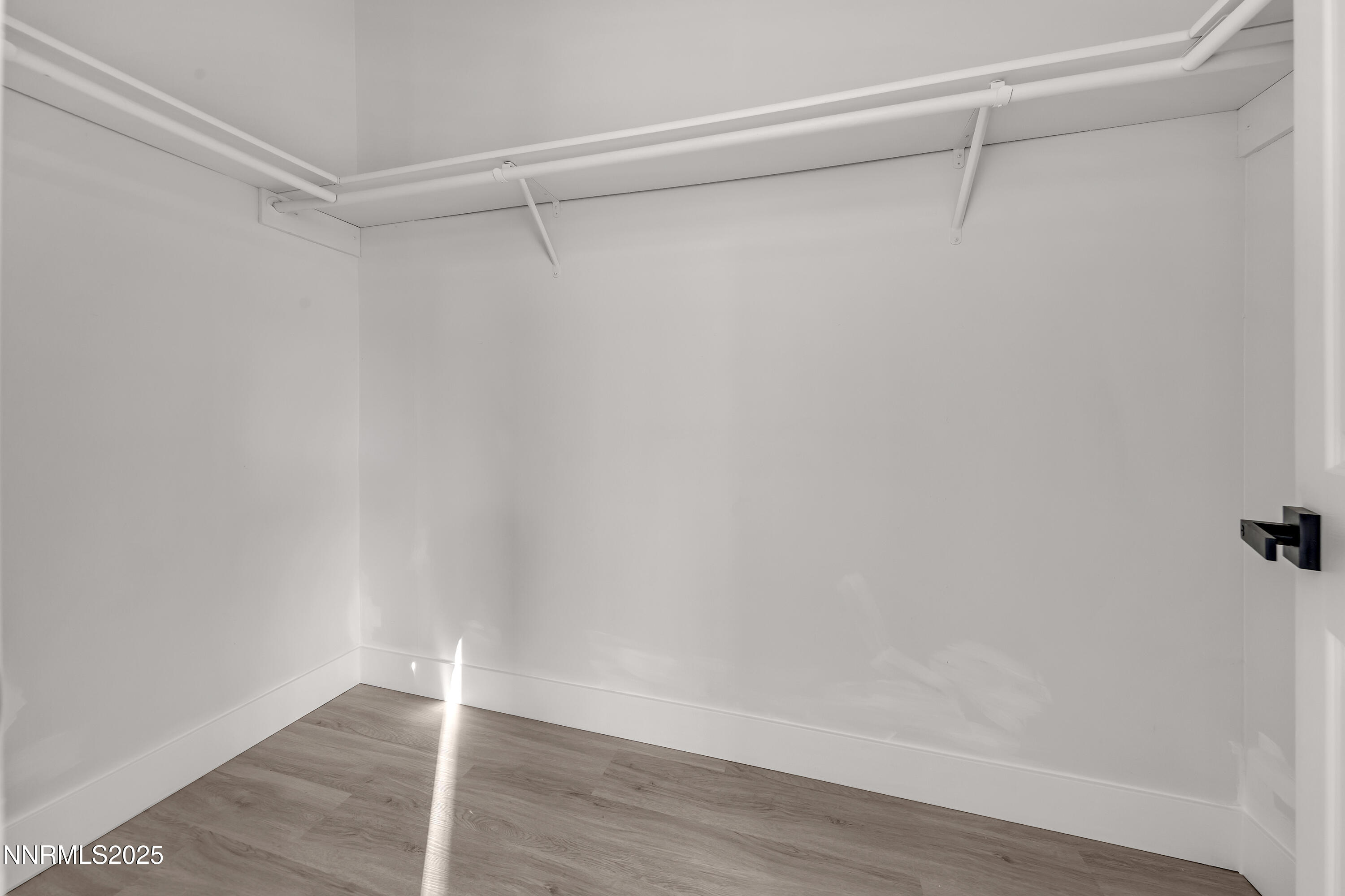 320 Ramsey Way Reno, NV 89506 - Photo 22 of 40 a view of a room with shelf on the wall