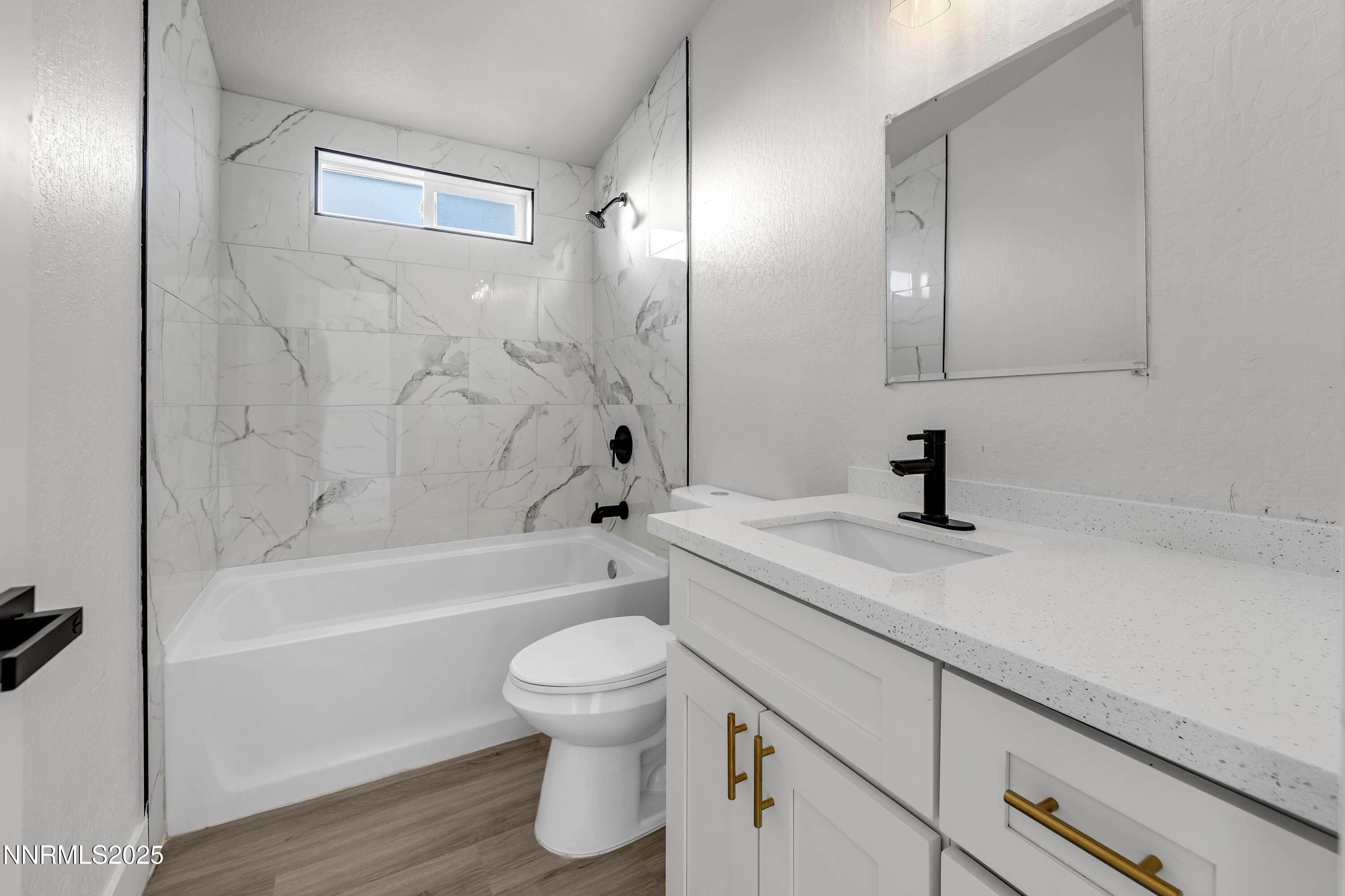 320 Ramsey Way Reno, NV 89506 - Photo 29 of 40 a bathroom with a sink a toilet and a bathtub