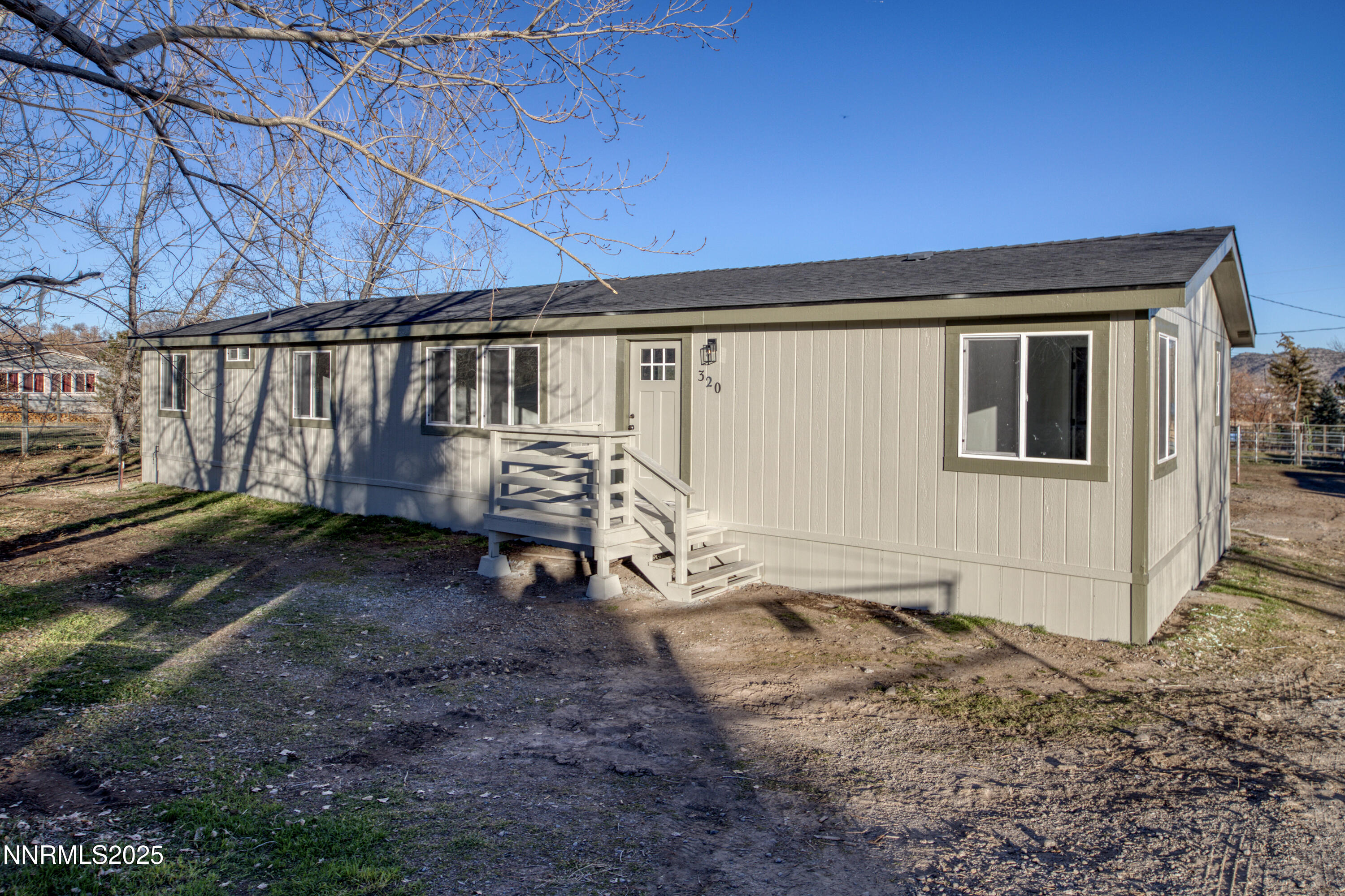 320 Ramsey Way Reno, NV 89506 - Photo 4 of 40 a backyard of a house with barbeque oven table and chairs