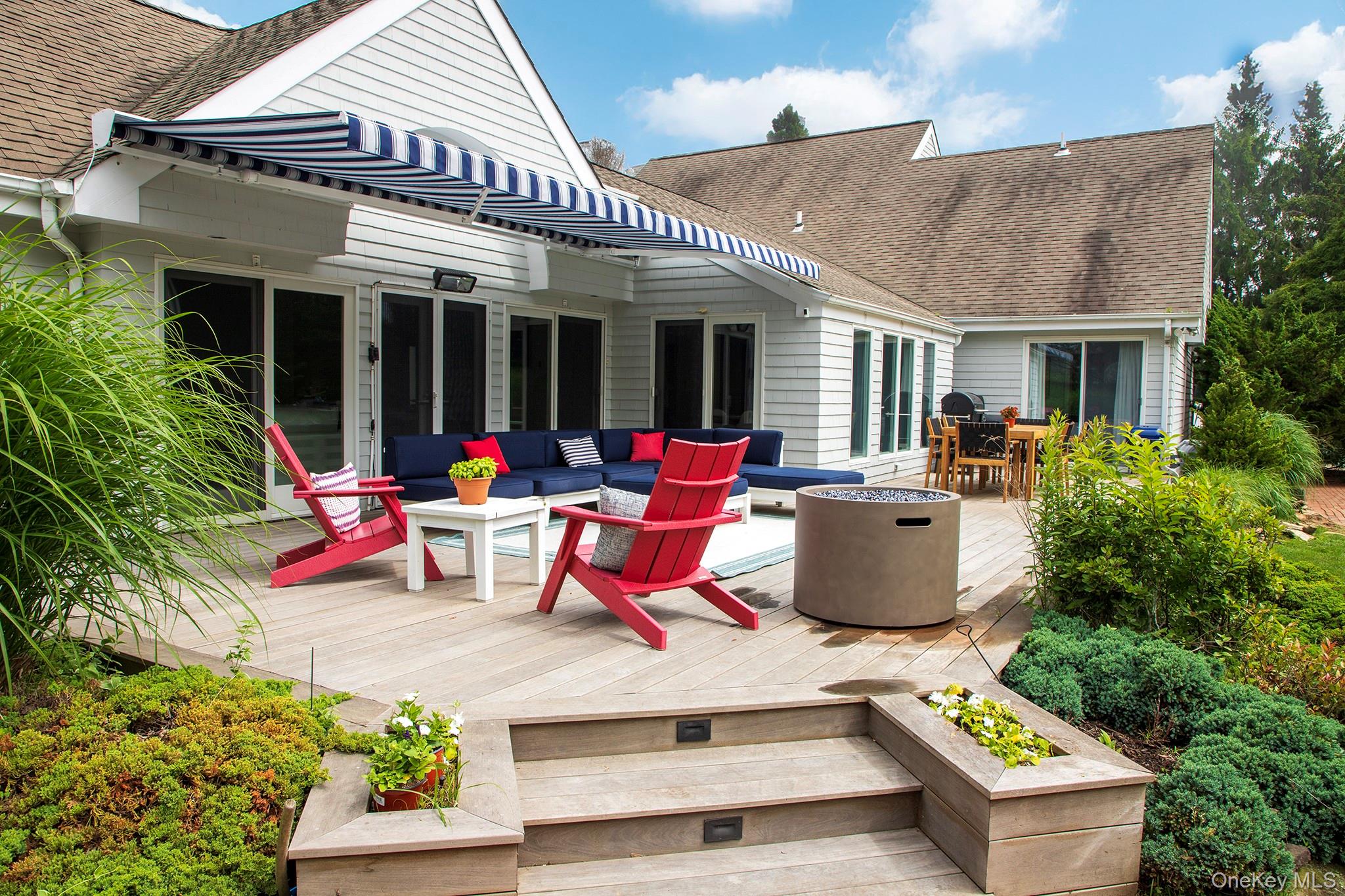 16 Laila Lane Remsenburg, NY 11960 - Photo 27 of 36 a building outdoor space with patio furniture