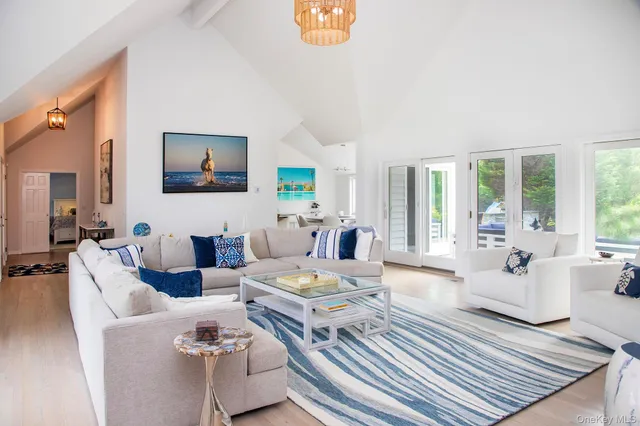 a living room with furniture or couch and a flat screen tv