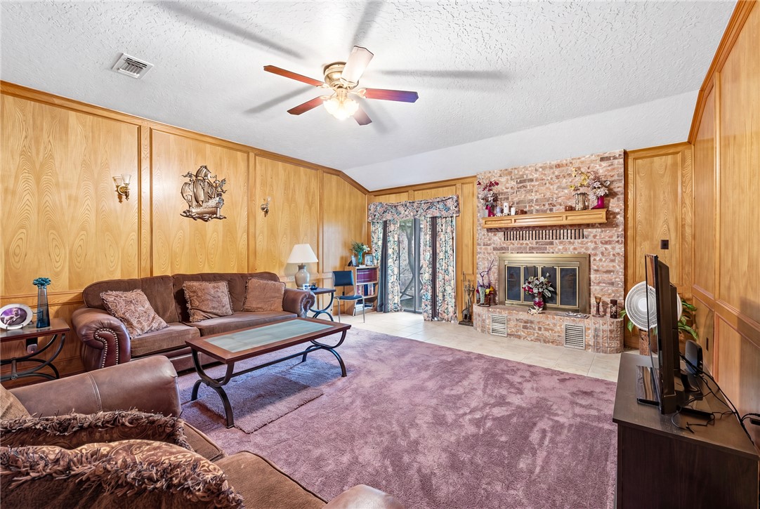 706 Mesquite Street Calvert, TX 77837 - Photo 13 of 23 a living room with furniture and a flat screen tv
