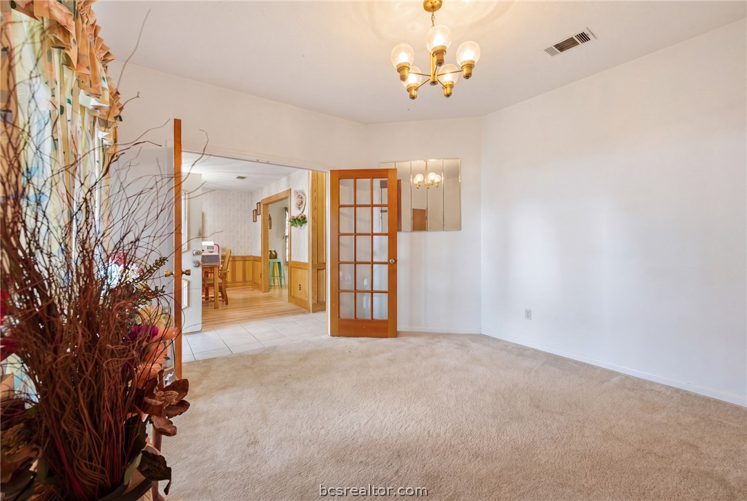 706 Mesquite Street Calvert, TX 77837 - Photo 7 of 23 a view of a livingroom with a chandelier