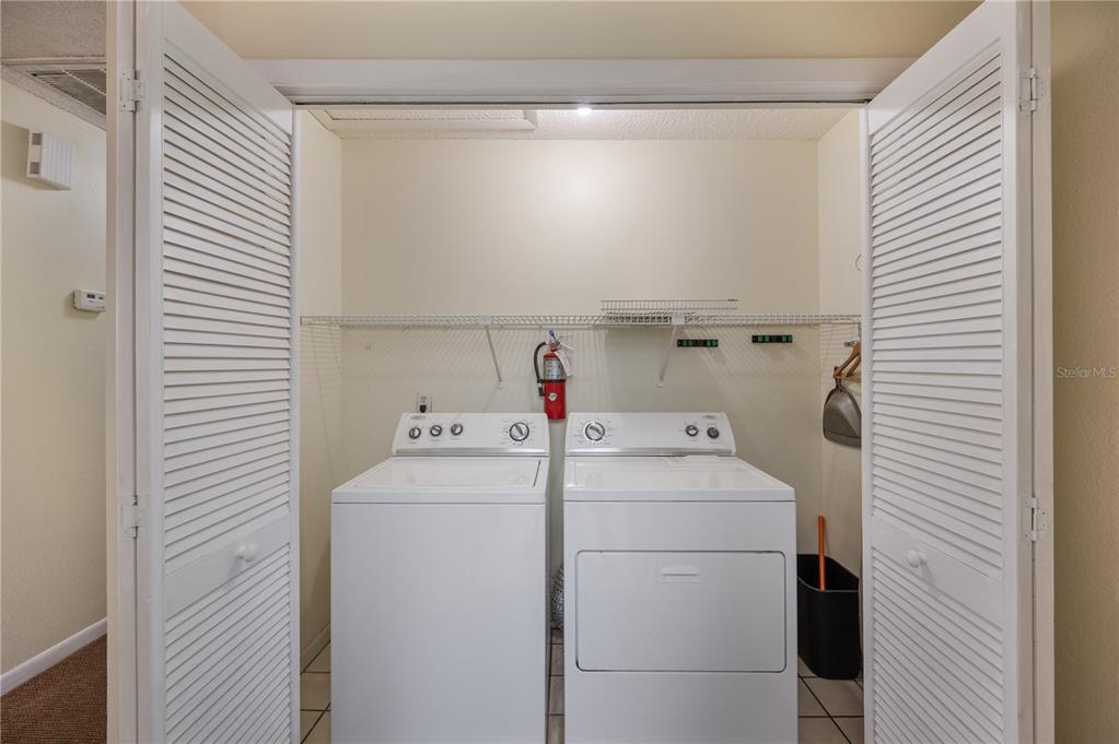 4231 Oak Loop, Unit 51 Mulberry, FL 33860 - Photo 16 of 29 a utility room with dryer and washer