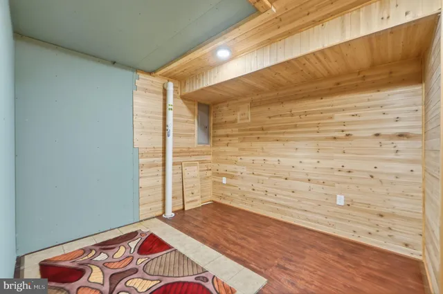 a view of a livingroom with furniture and wooden floor