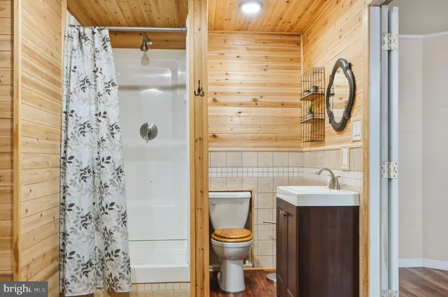 a view of a patio with a table and chairs