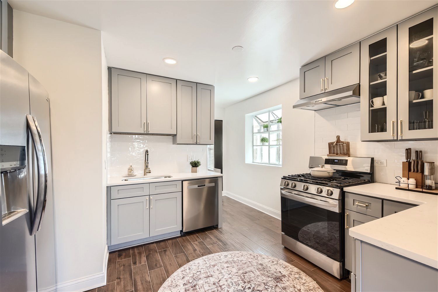 2502 Keystone Avenue North Riverside, IL 60546 - Photo 7 of 27 a kitchen with stainless steel appliances granite countertop a stove a sink dishwasher and a refrigerator