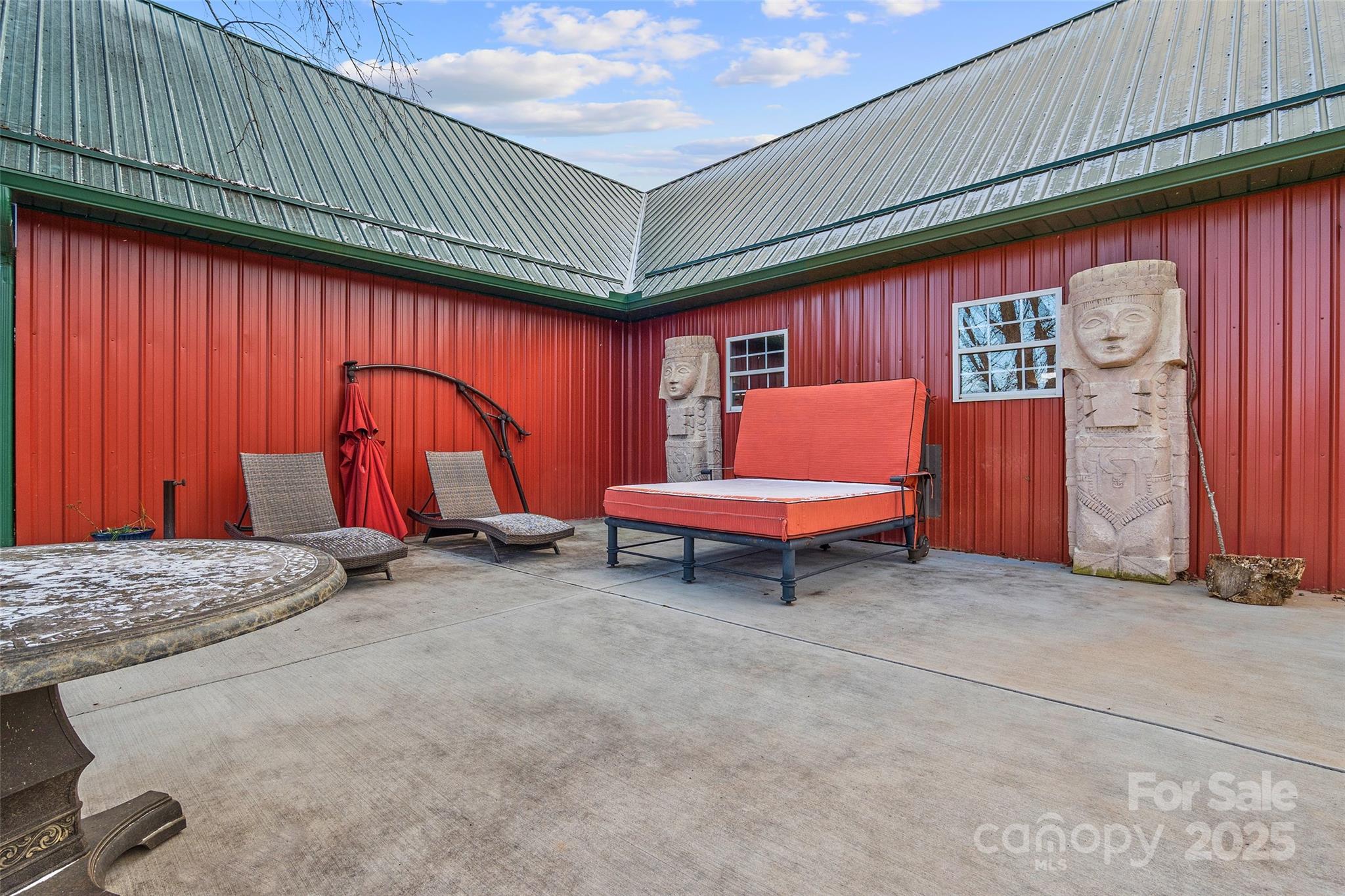 145 Keener Road Canton, NC 28716 - Photo 12 of 48 a backyard of a house with barbeque oven table and chairs