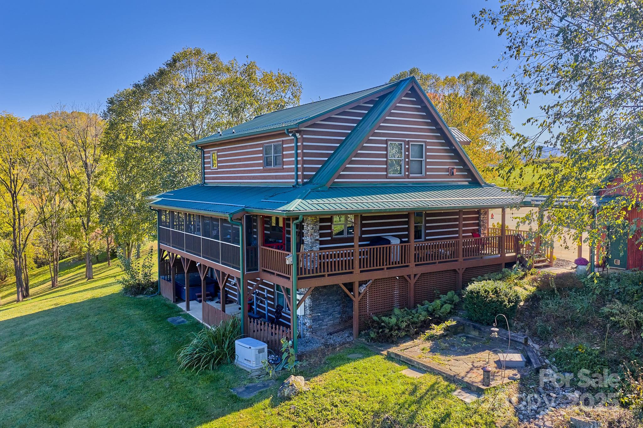 145 Keener Road Canton, NC 28716 - Photo 13 of 48 front view of a house with a yard