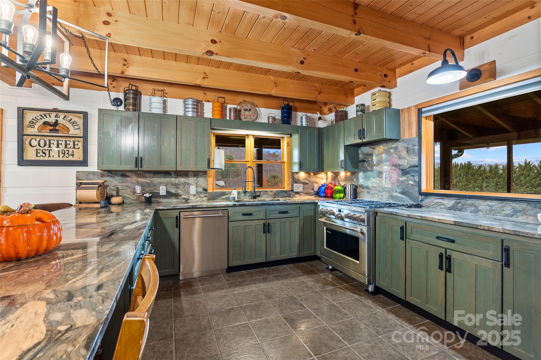 145 Keener Road Canton, NC 28716 - Photo 23 of 48 a kitchen with lots of counter top space and appliances