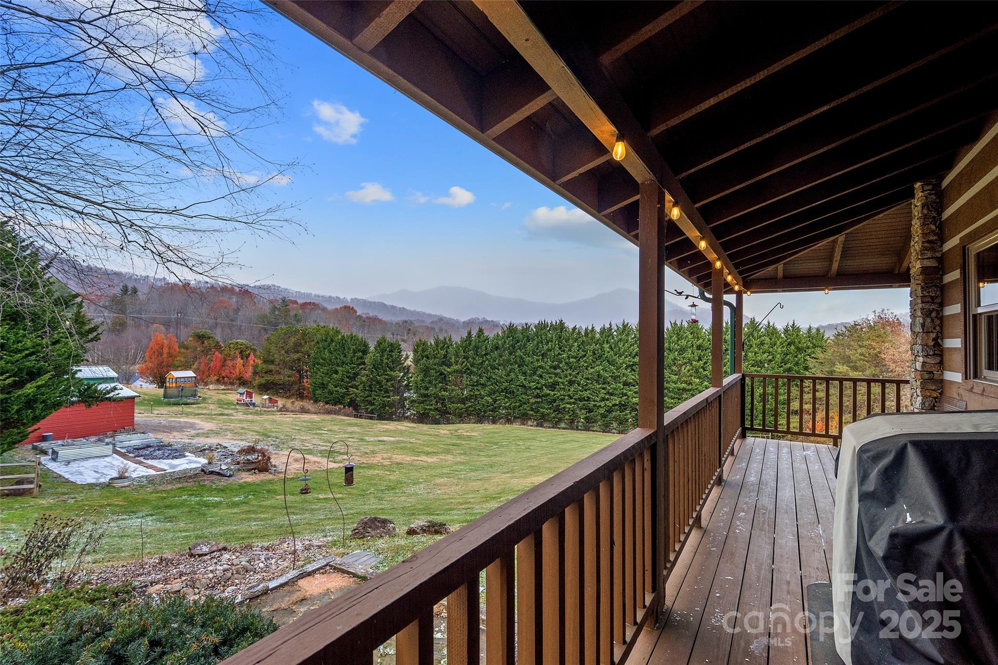 145 Keener Road Canton, NC 28716 - Photo 28 of 48 a view of a porch and garden