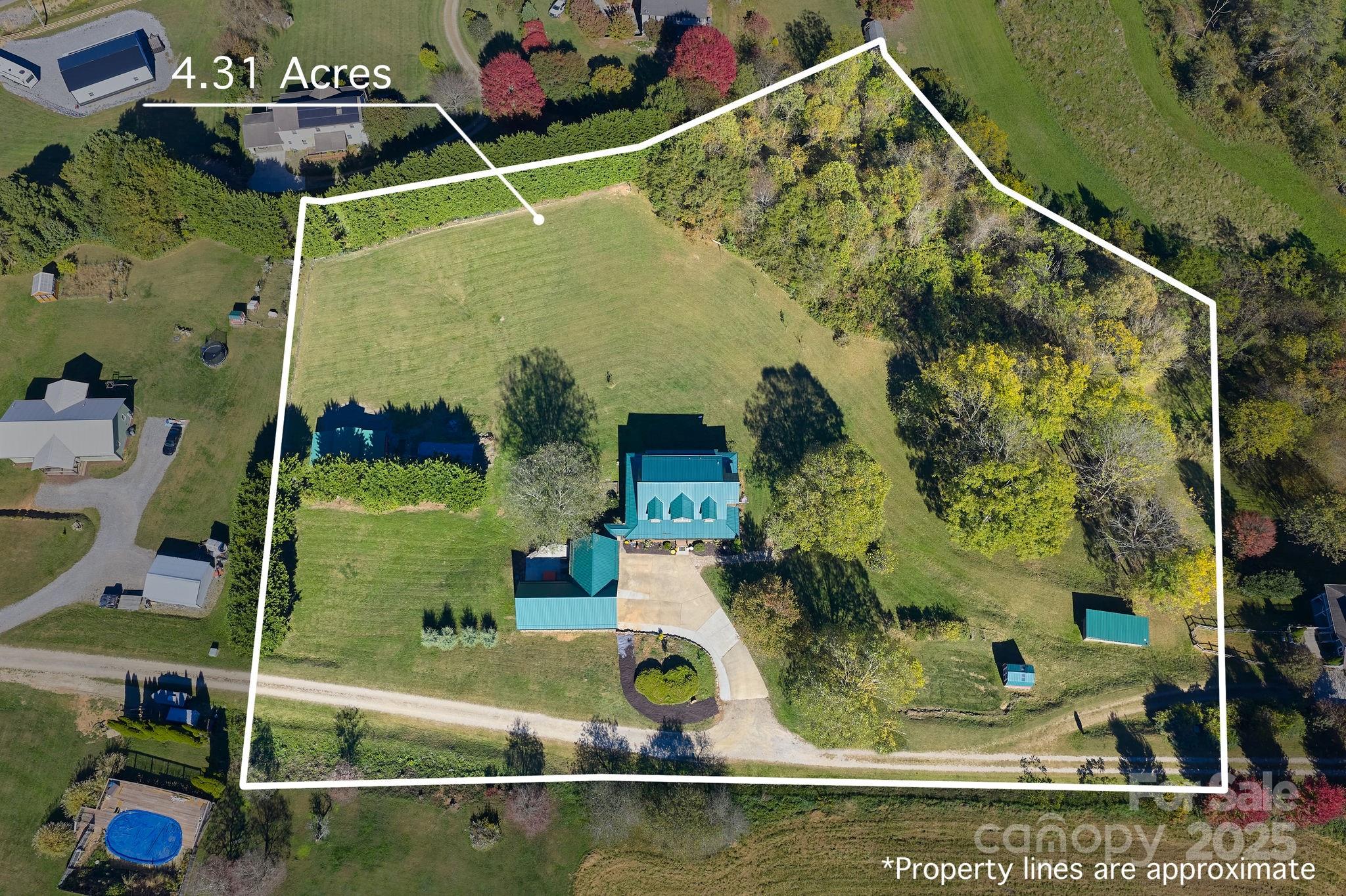 145 Keener Road Canton, NC 28716 - Photo 3 of 48 an aerial view of a house