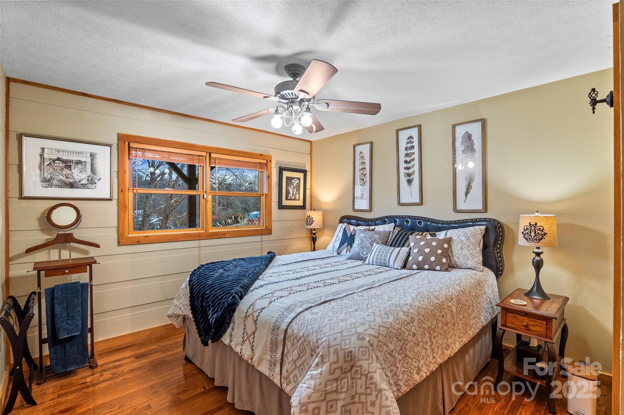 145 Keener Road Canton, NC 28716 - Photo 32 of 48 a bedroom with a bed and a window