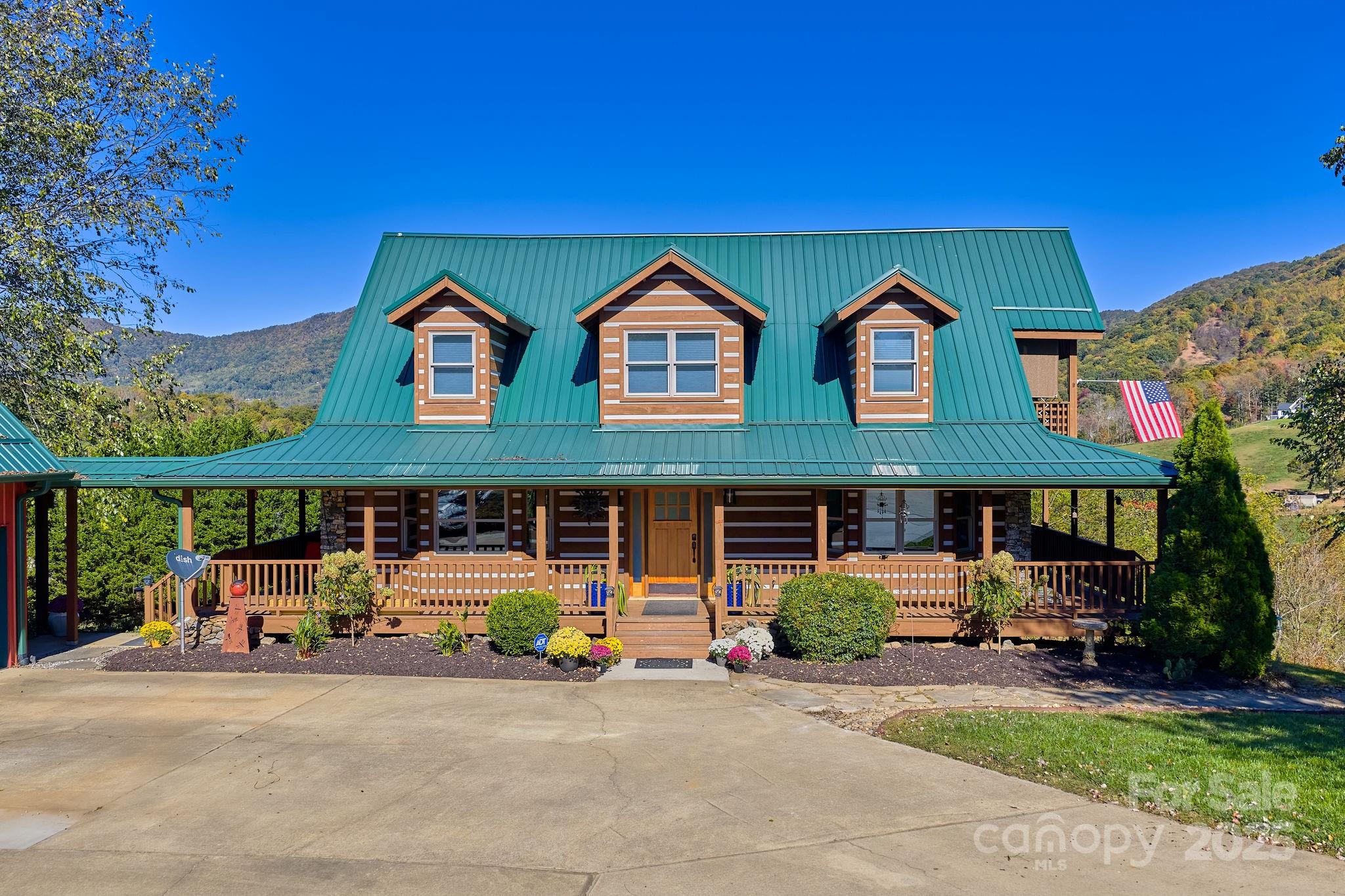 145 Keener Road Canton, NC 28716 - Photo 6 of 48 a front view of a house with garden