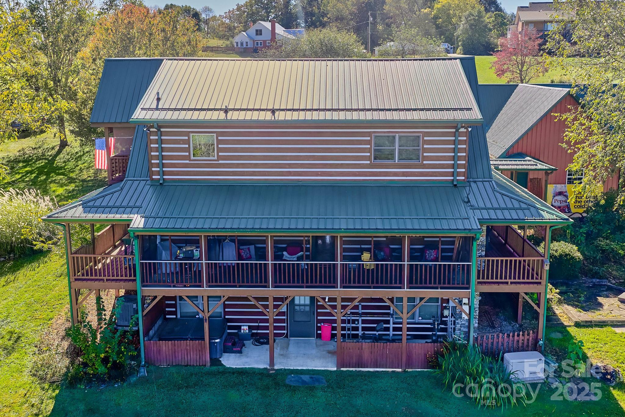 145 Keener Road Canton, NC 28716 - Photo 7 of 48 a front view of a house with garden