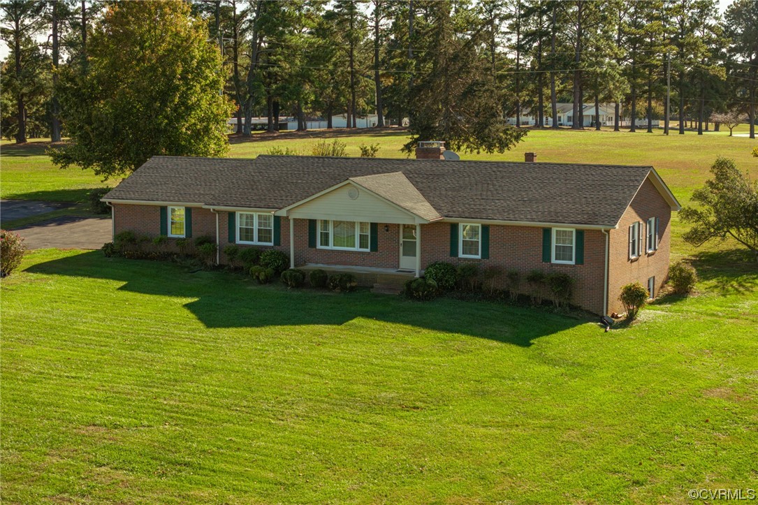 501 Country Club Road Keysville, VA 23947 - Photo 1 of 14 a front view of a house with yard and green space