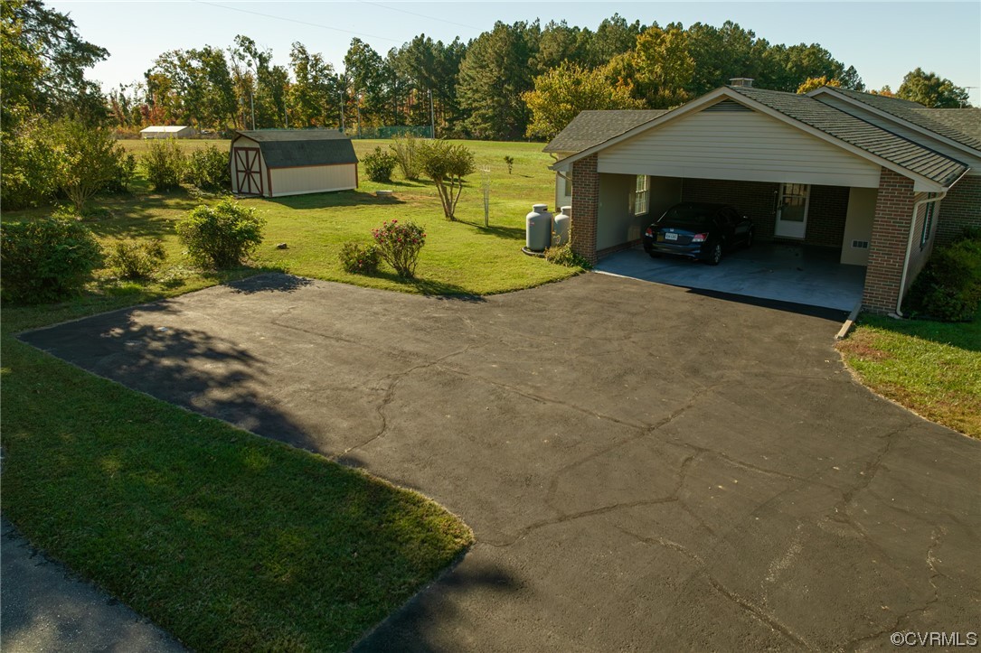 501 Country Club Road Keysville, VA 23947 - Photo 14 of 14 a view of a house with backyard and garden