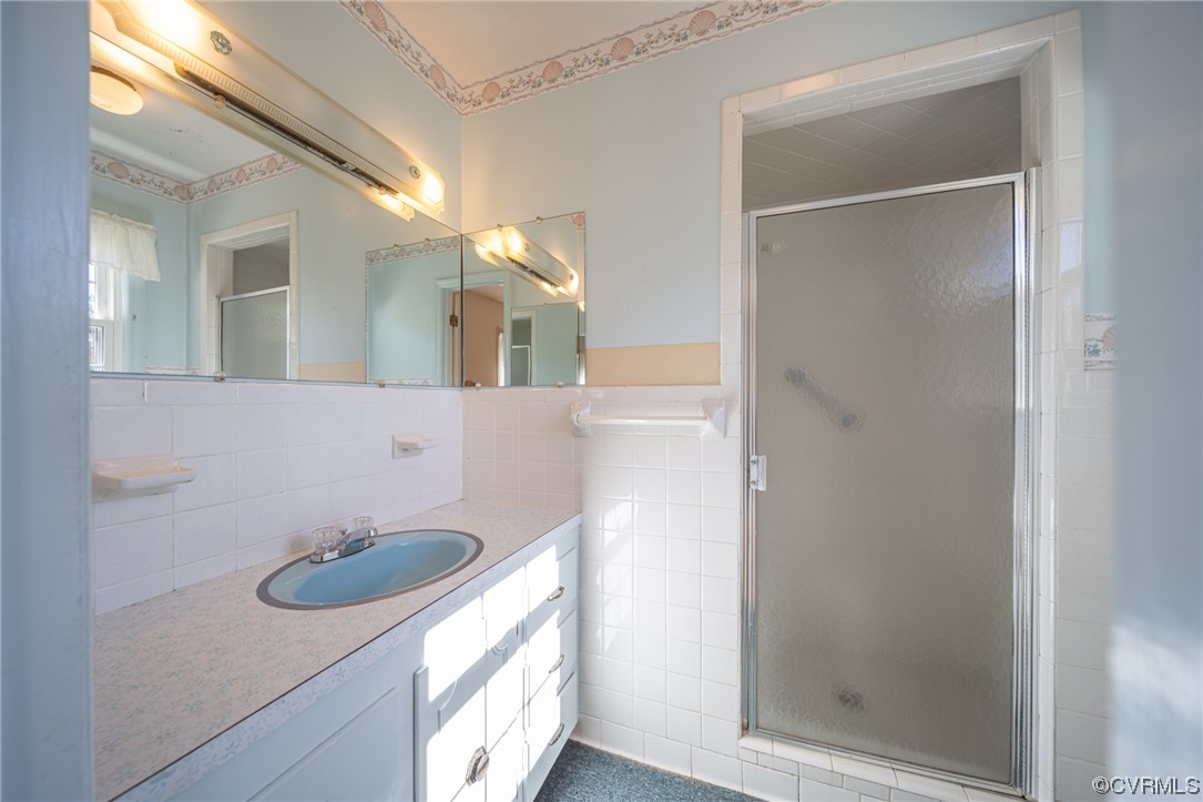 501 Country Club Road Keysville, VA 23947 - Photo 9 of 14 a bathroom with a sink and mirror