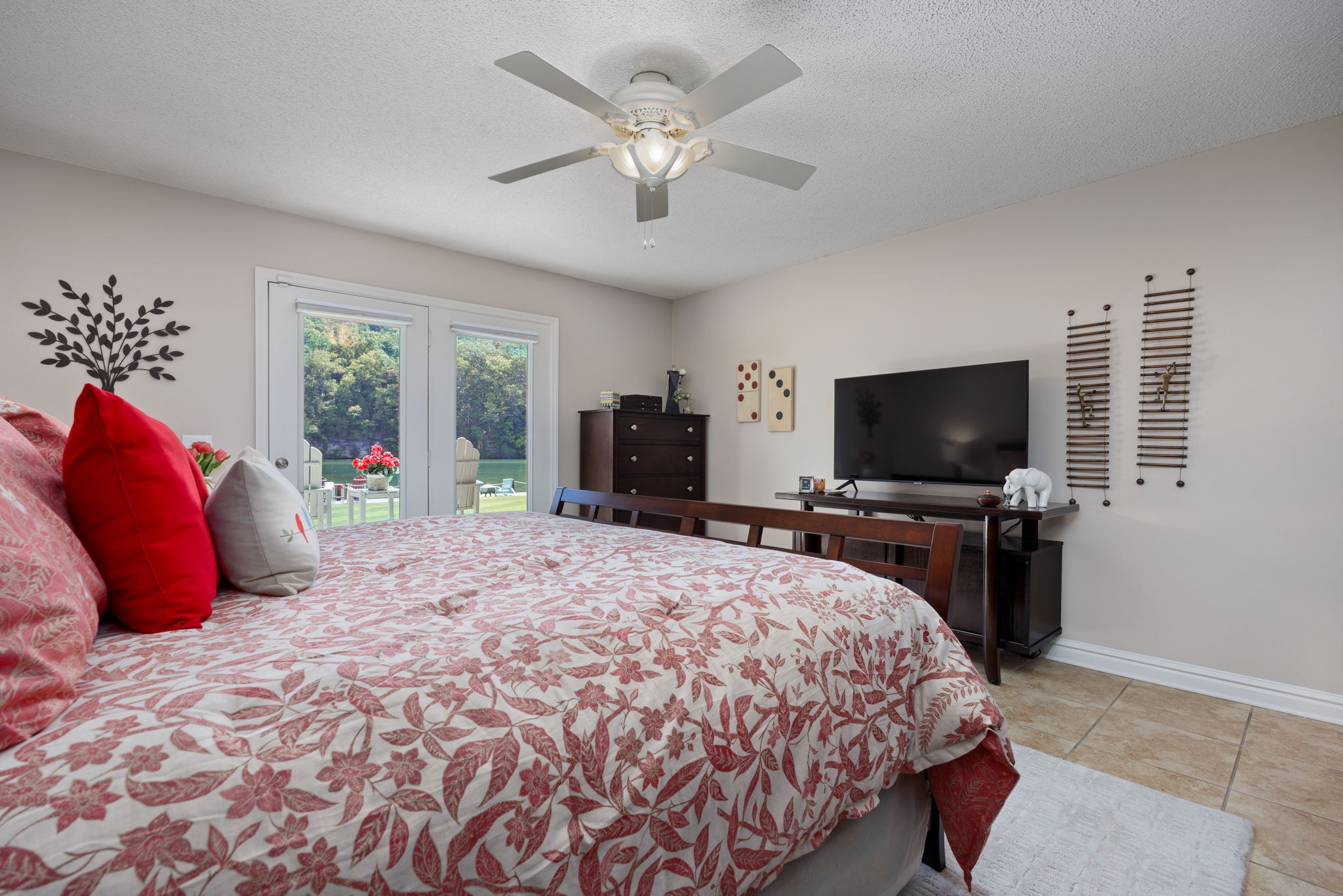 568 County Road 322 Florence, AL 35634 - Photo 19 of 60 a bedroom with a bed and a flat screen tv