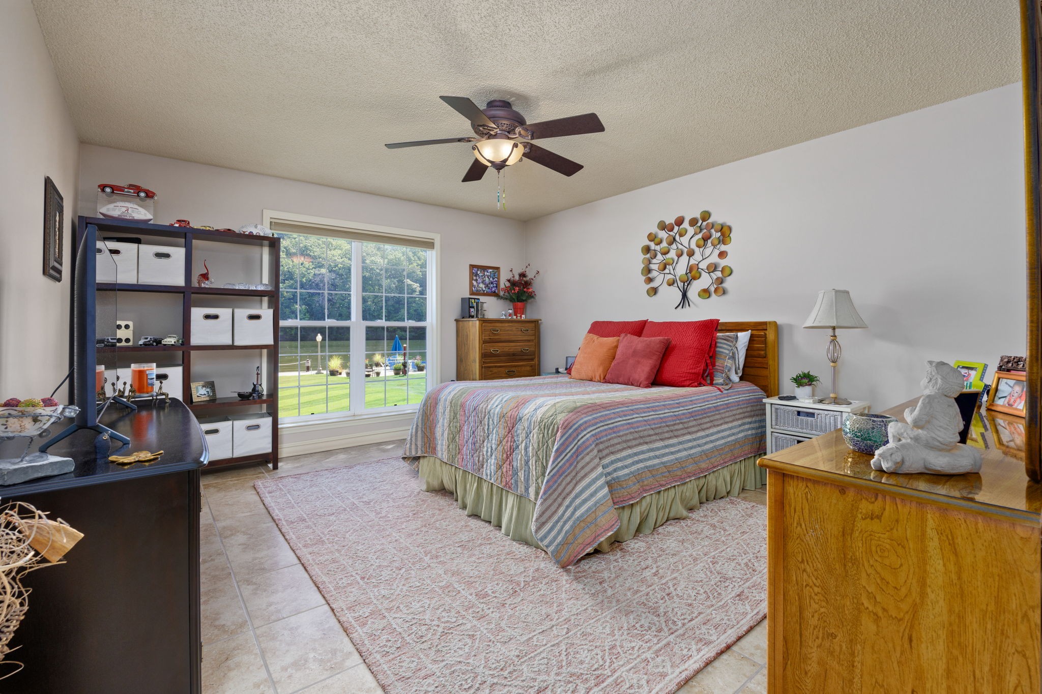 568 County Road 322 Florence, AL 35634 - Photo 25 of 60 a bedroom with a bed and a walk in closet