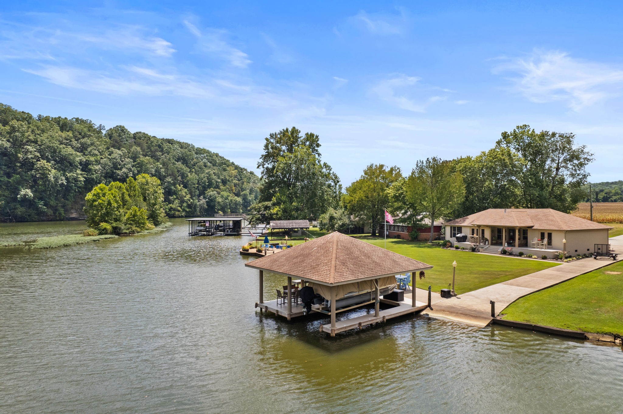 568 County Road 322 Florence, AL 35634 - Photo 45 of 60 a swimming pool with outdoor seating and yard