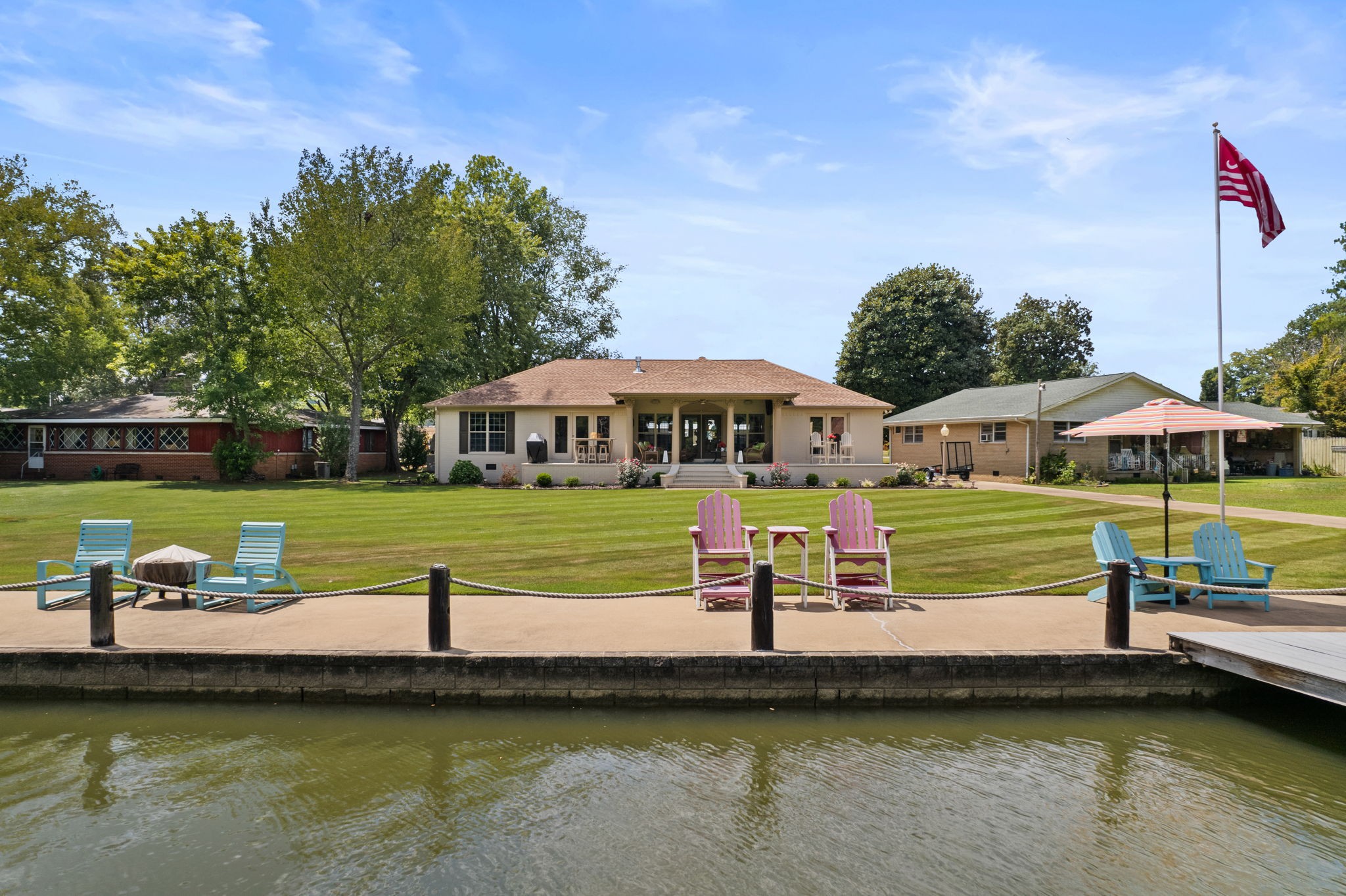568 County Road 322 Florence, AL 35634 - Photo 48 of 60 a aerial view of a house with a garden and lake view