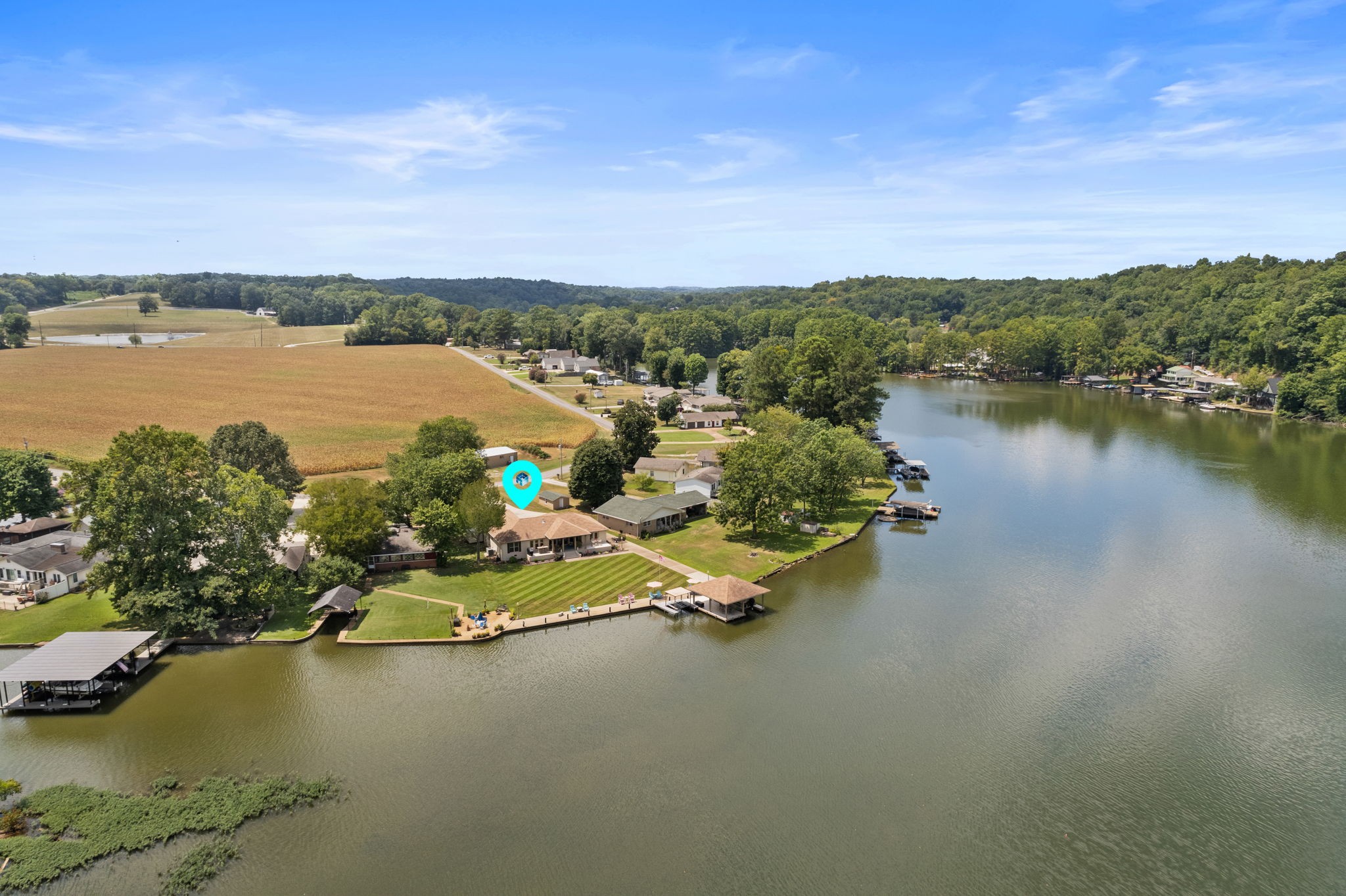 568 County Road 322 Florence, AL 35634 - Photo 51 of 60 a view of a lake with a houses