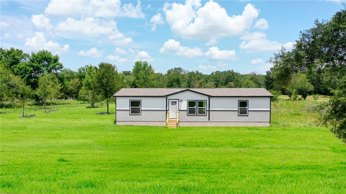 9960 Goose Prairie Road Midway, TX 75852 - Photo 1 of 27 AI Generated Grass