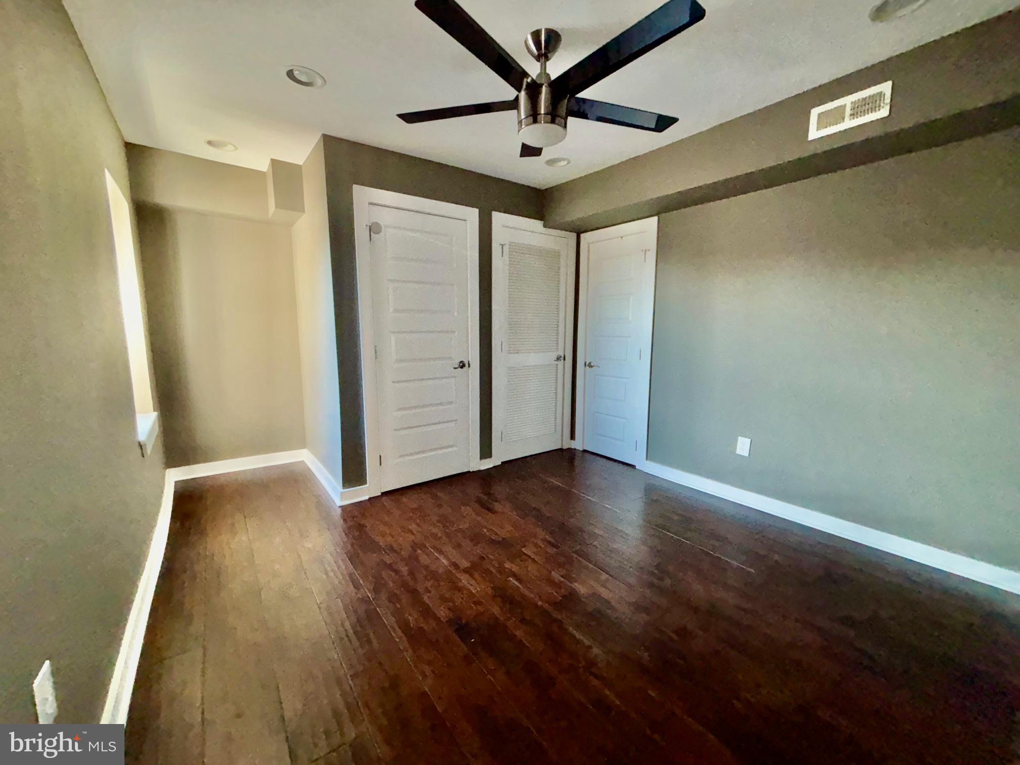 1865 Frankford Avenue, Unit B Philadelphia, PA 19125 - Photo 11 of 12 a view of room with wooden floor and fan