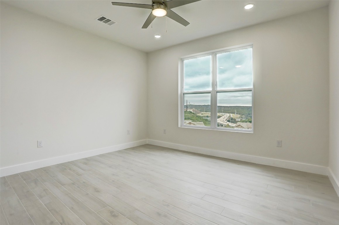 4300 Mansfield Dam Road, Unit 1421 / 1431 Austin, TX 78734 - Photo 17 of 32 an empty room with a window