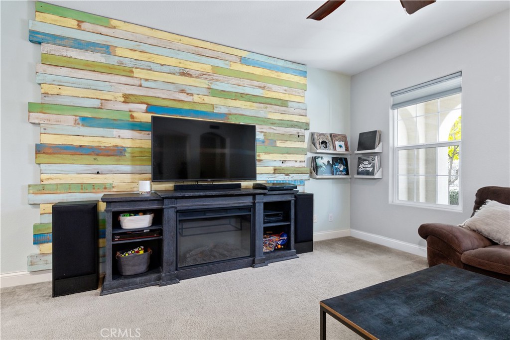 9354 Riberena Circle Atascadero, CA 93422 - Photo 19 of 47 a living room with furniture and a flat screen tv