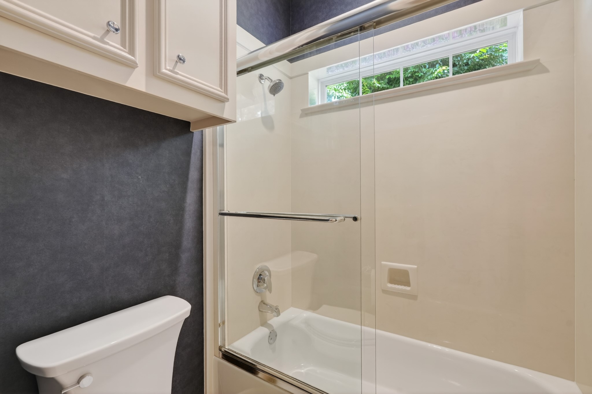 20714 Flora View Court Spring, TX 77379 - Photo 33 of 40 a bathroom with a toilet and a shower