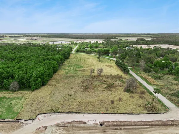 a view of a yard with an outdoor space