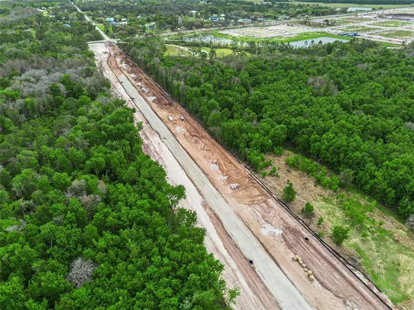 a view of a yard from a balcony