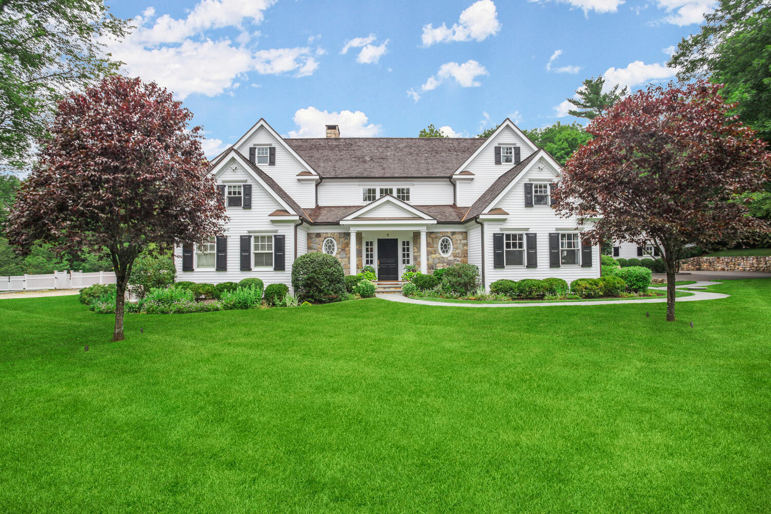 3 Half Mile Road Darien, CT 06820 - Photo 2 of 49 a front view of a house with a garden