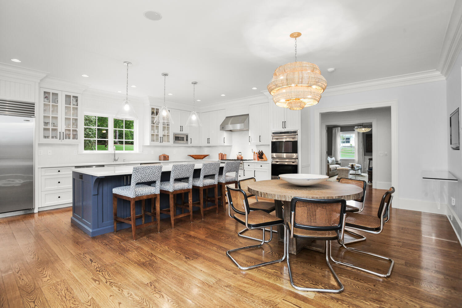 3 Half Mile Road Darien, CT 06820 - Photo 15 of 49 a view of a dining room with furniture window and wooden floor