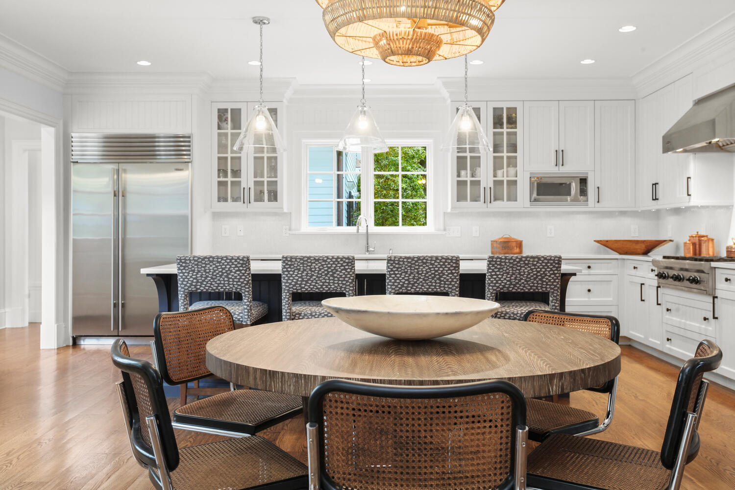 3 Half Mile Road Darien, CT 06820 - Photo 16 of 49 a kitchen with a table chairs and a dining table