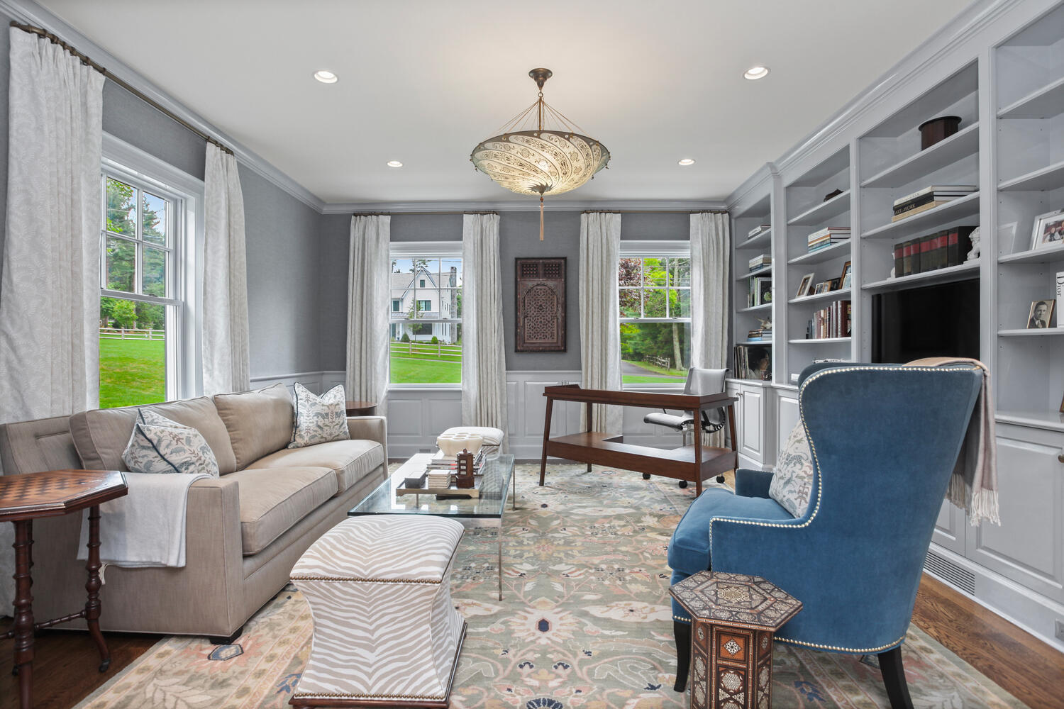 3 Half Mile Road Darien, CT 06820 - Photo 19 of 49 a living room with furniture chandelier and a large window